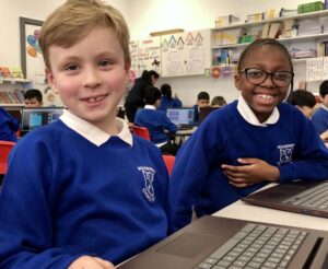 IMG_7760-750x616 smiling boys in computer class